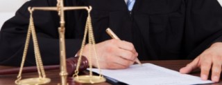 Wells Fargo, JPMorgan Chase Face Justice for Mortgage Kickbacks
