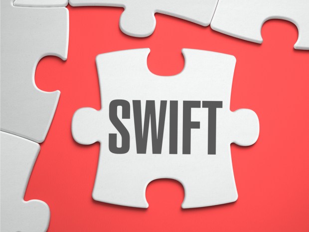 SWIFT Likes Distributed Ledgers, Sort Of