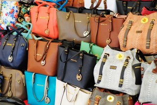 thredUP Takes On Luxury Consignment Giant