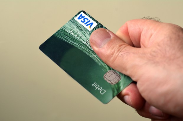 debit cards for former inmates too expense