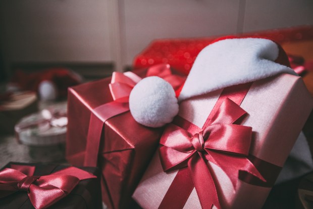 Coupons, Sales Drive Holidays Shoppers In Store