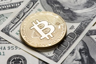 Bitcoin Surpasses $5,000 For Brief Time Before Retreating