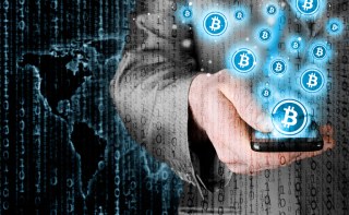 Coinbase CEO Talks Down Bitcoin Adoption