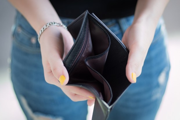 Capital One, Discover Tighten Credit Limits As Debt Peaks