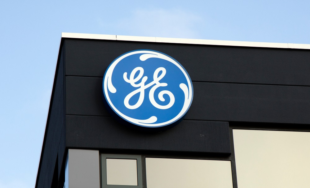 GE Slashing Quarterly Dividend, Reorganizing Power Unit, Facing DOJ Inquiry