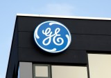 GE Slashing Quarterly Dividend, Reorganizing