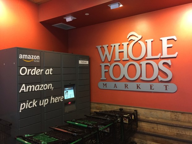Amazon Trials Delivery Services At Whole Foods