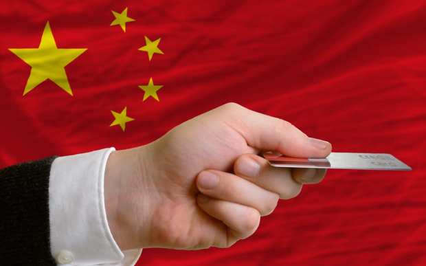 In China, Some Banks Shy Away From Letting Cards Max Out