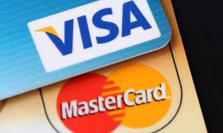 US Mulls Banning Visa, Mastercard From Processing In Venezuela