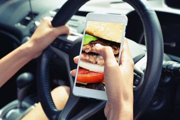 smartphone in car ordering food