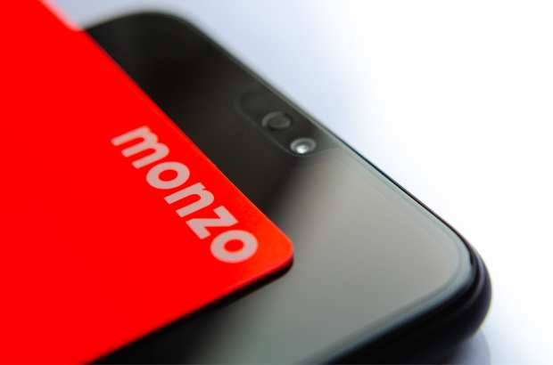 Monzo bank card and smartphone