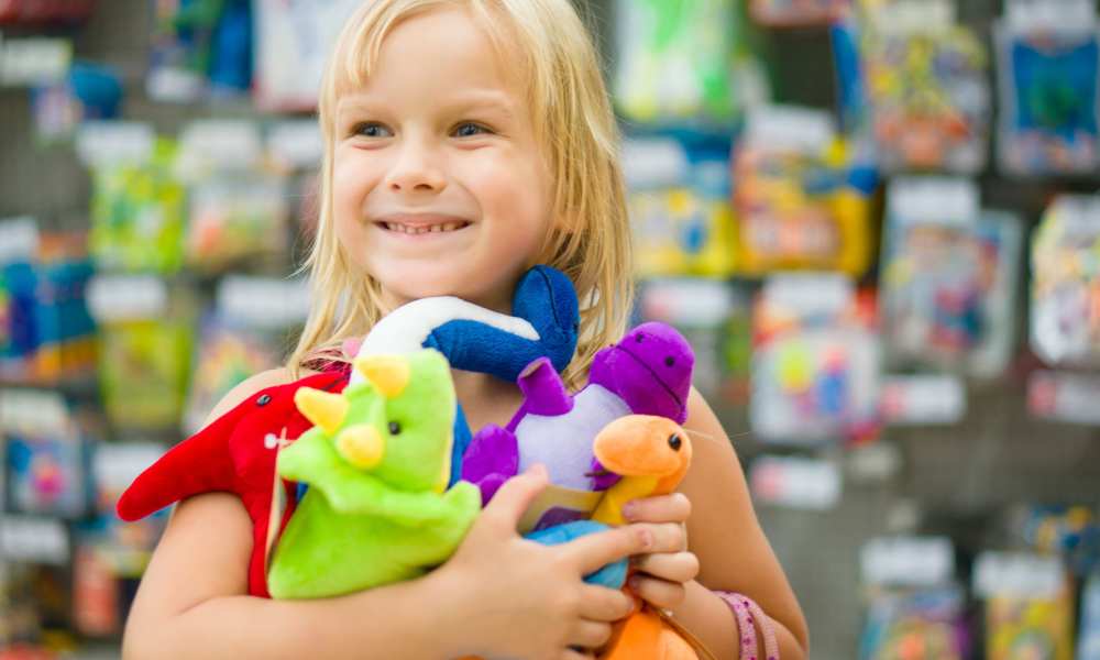 little girl with toys