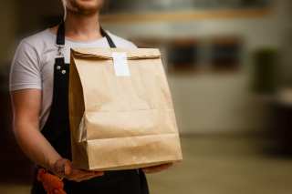 UK Competition Regulator Eyes Amazon Deliveroo Stake