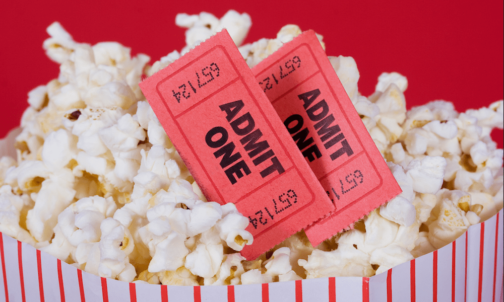 DOJ Seeks To End Ban Of Hollywood Studios Buying Theaters