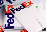 FedEx Joins UPS In Adding Delivery Fees Due To Volume Hike