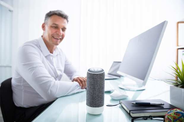 man talking to voice assistant