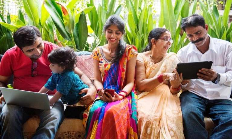 Indian family with laptops