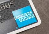AmEx Sees Card Member Loans Up 7 Percent