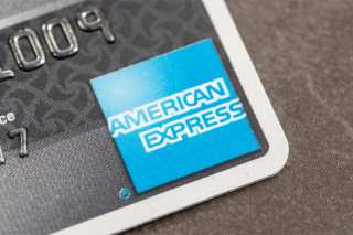 AmEx Sees Card Member Loans Up 7 Percent