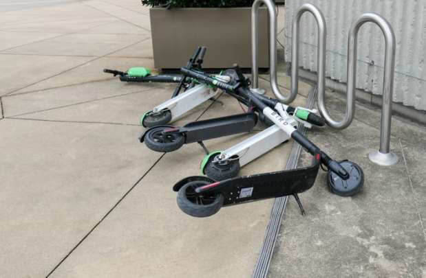 Lime, layoffs, profits, electric scooters, micromobility, transportation, startup, news
