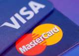 Australian regulators are considering stopping banks from routing “tap and go” card payments through Visa and Mastercard, when retailers could use EFTPOS.