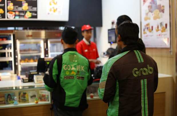 SoftBank Shareholders Push For Grab, Gojek Deal In Indonesia