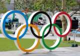 Coronavirus: Official Says Delay May Be Best For Olympics; American, Delta Reduce Schedule