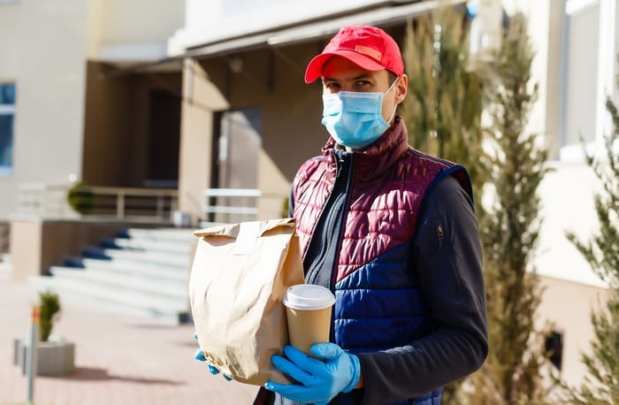 food delivery man with face mask