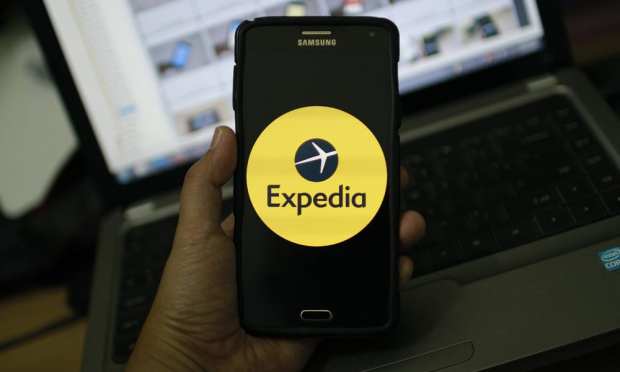Expedia To Slash Ad Spending