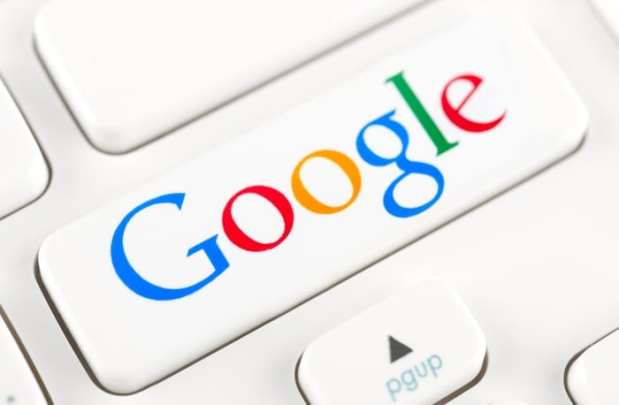 Google slashes marketing budget by half
