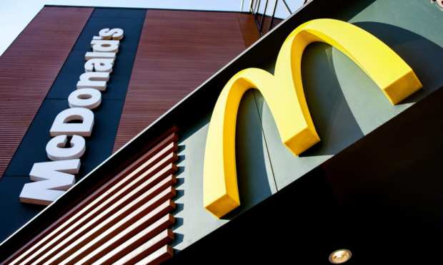 McDonald’s Sales Drop; CEO Takes 50 Pct. Pay Cut