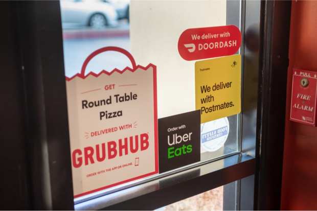 Grubhub, Uber Eats sign