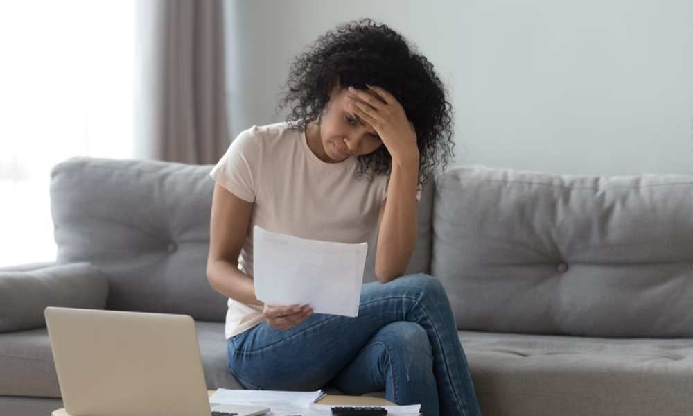 millennial woman financial stress