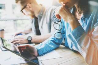 NICE Actimize Buys Guardian Analytics