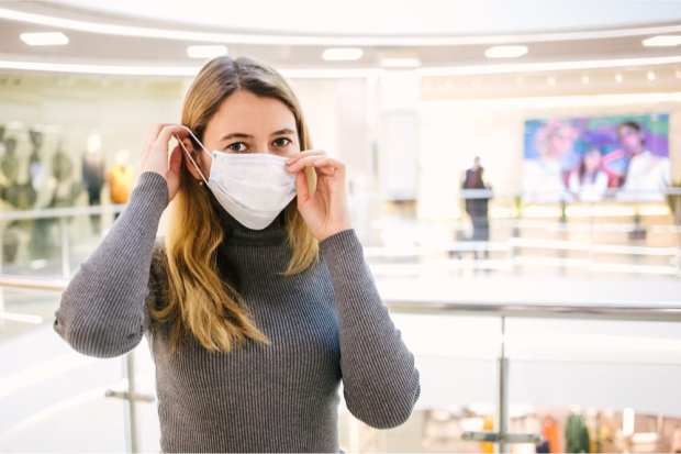 woman in store with mask