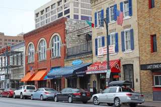 Texas Halts Reopening Plans As COVID Cases Spike