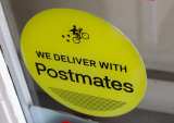 Uber Eyes Postmates Buy