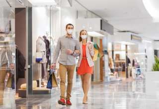 COVID-19 Spikes Hinder Retail Recovery