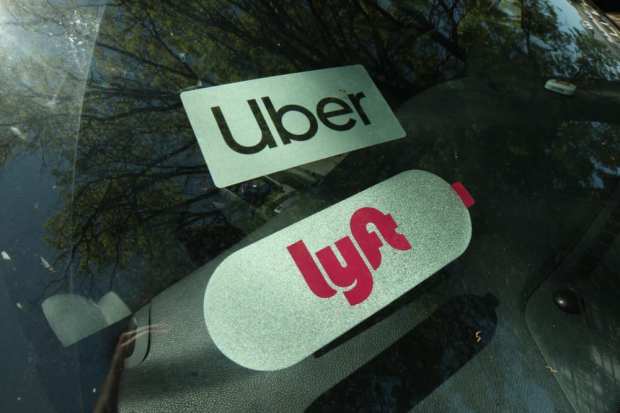 MA Files Suit Against Uber, Lyft On Rider Status