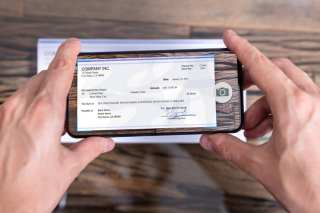 How ‘Pandenomics’ Will Drive Mobile Check Deposits