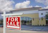 Falling Commercial Real Estate Prices Threaten Bank Losses