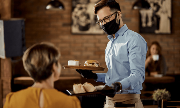 restaurant waiter in face mask