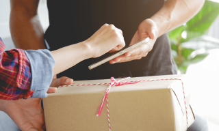 UPS, FedEx Take Different Star Turns As Holiday Shipping Crisis Accelerates