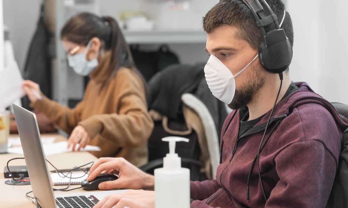 COVID Surge Sends Americans Back To Work At Home In Another Economic Hit To Cities