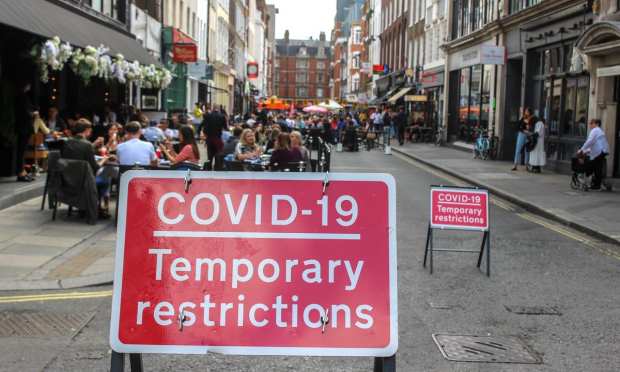 COVID restrictions sign