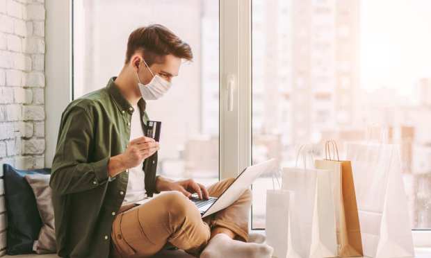 Pandemic Surge Slows Consumer Spending; December Retail Sales Drop