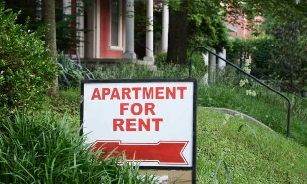 suburban apartment for rent sign