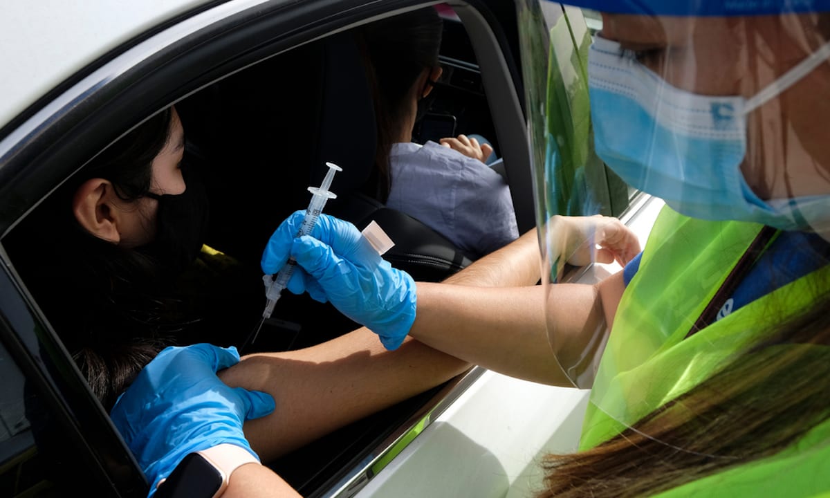 How The Race Between Vaccines And Infection Rates Could Impact Reopening
