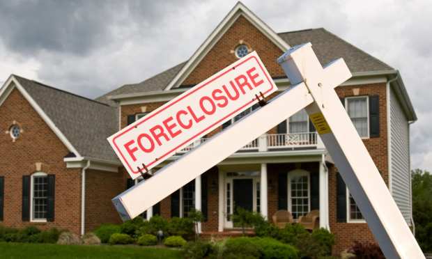 foreclosure sign at house