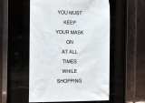 Some Stores Stick With Masks Despite Loosening Requirements